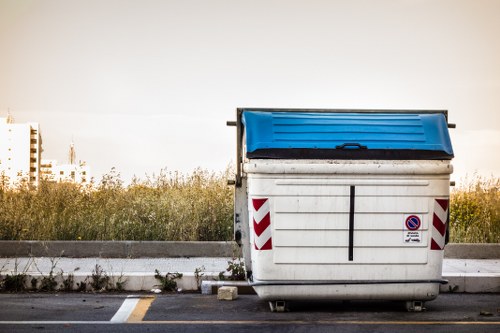 Front view of a skip on a residential street for waste collection